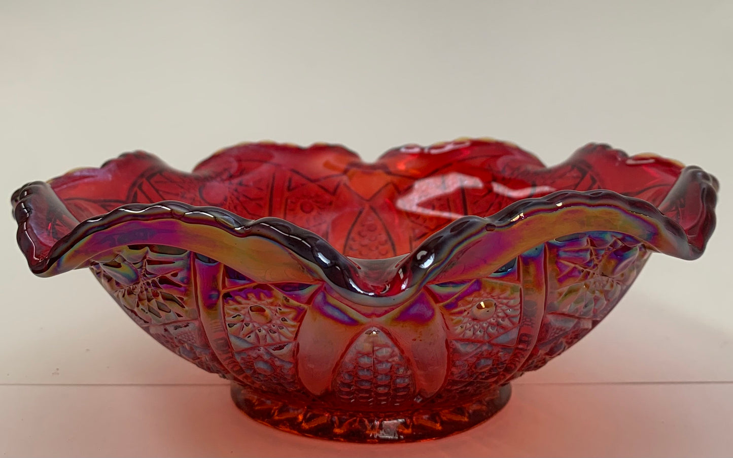 Vintage Indiana Carnival Glass with Ruffled Edge in Iridescent Sunset Red